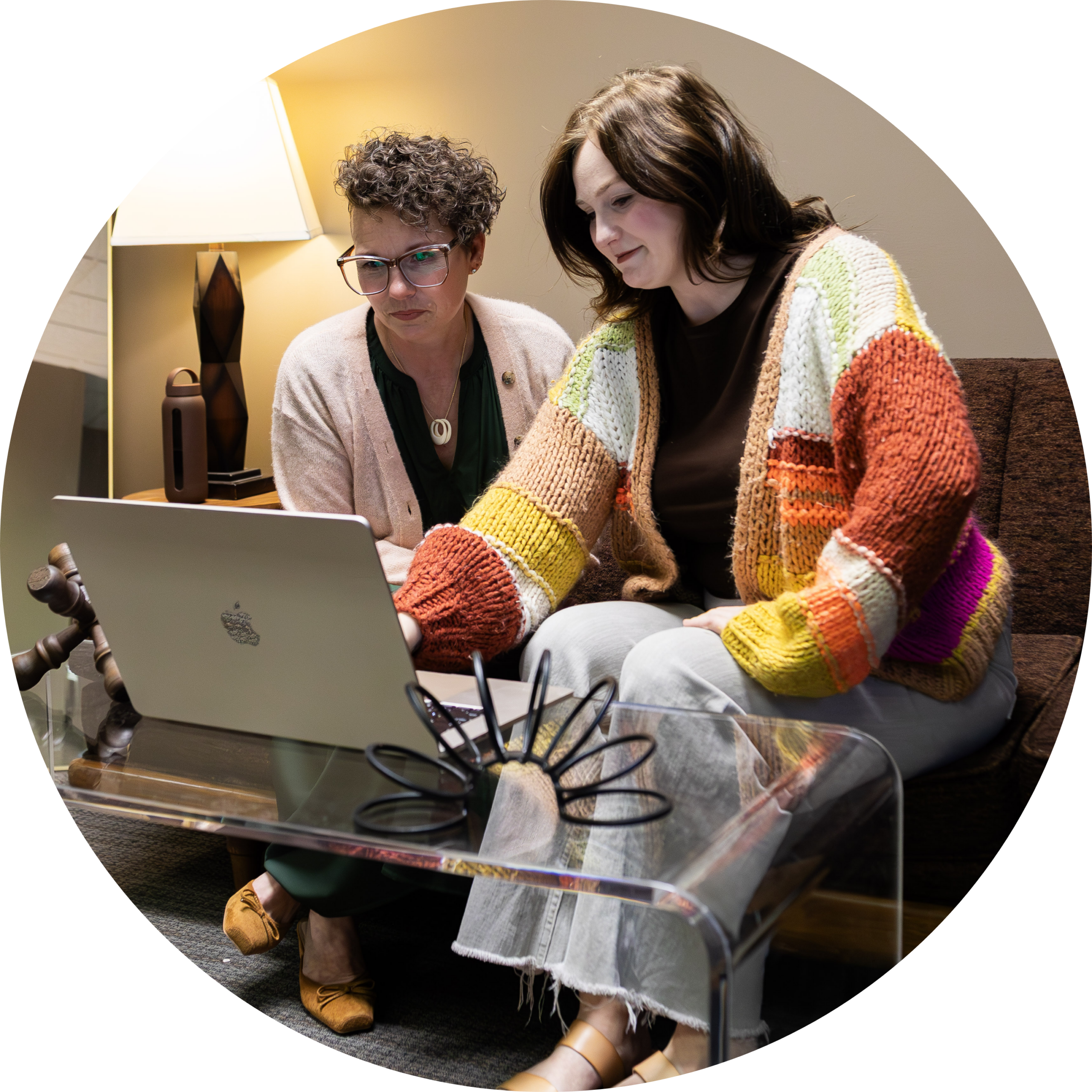 Taylor and William Nihsen reviewing a client campaign together